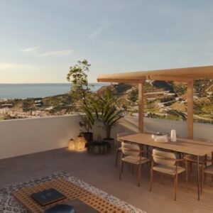 Áticos panorámicos de 2 dormitorios con solárium privado y vistas infinitas al mar en Torrox.